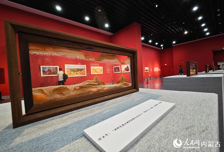 民革眼中的“三北”攻坚战纪实影像展馆。人民网记者 张雪冬摄